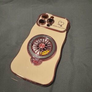 Rose Gold Phone Case with a Spinning Design and Stand. 15 Pro Max